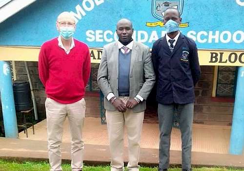 Joseph with Johnny Onslow of Vanessa Grant Trust and Victor, a student support with trust
